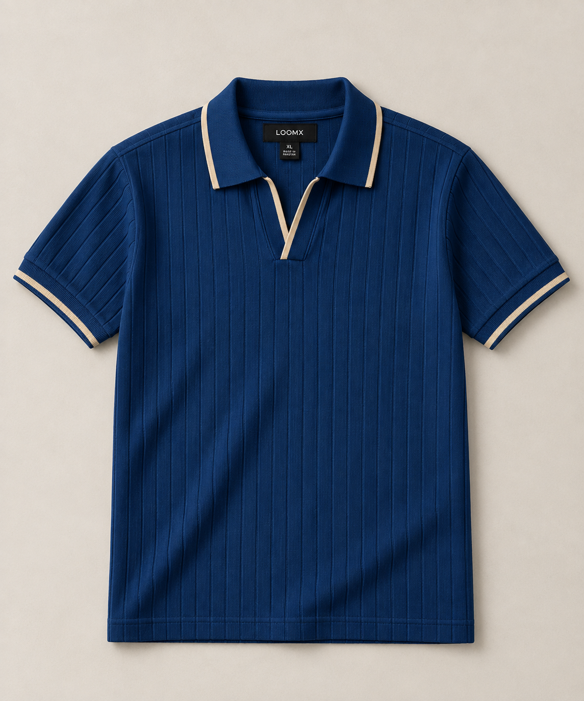 LOOMX Blue Drop Needle Polo with beige contrast tipping — front flat lay